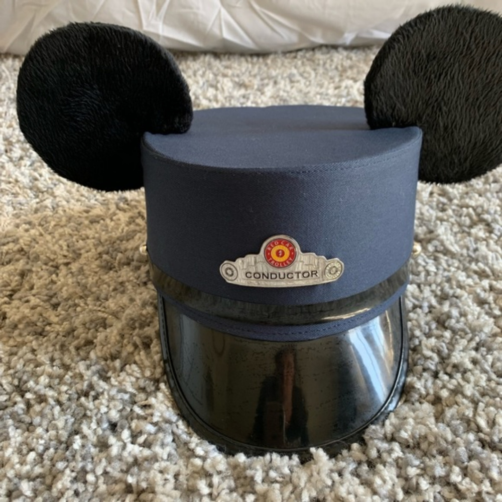 Mickey conductor red trolley ears.